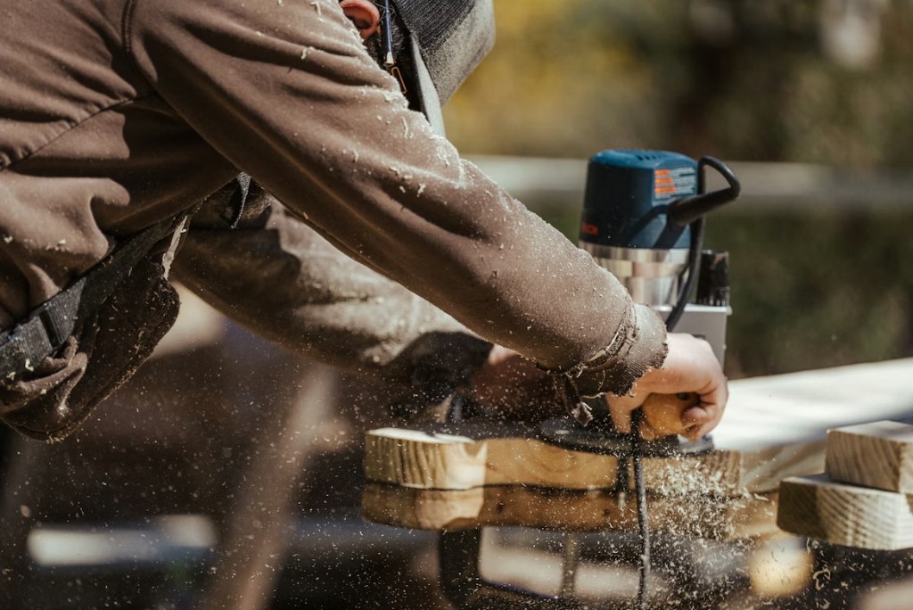 Contractor performing detailed woodworking during a home project